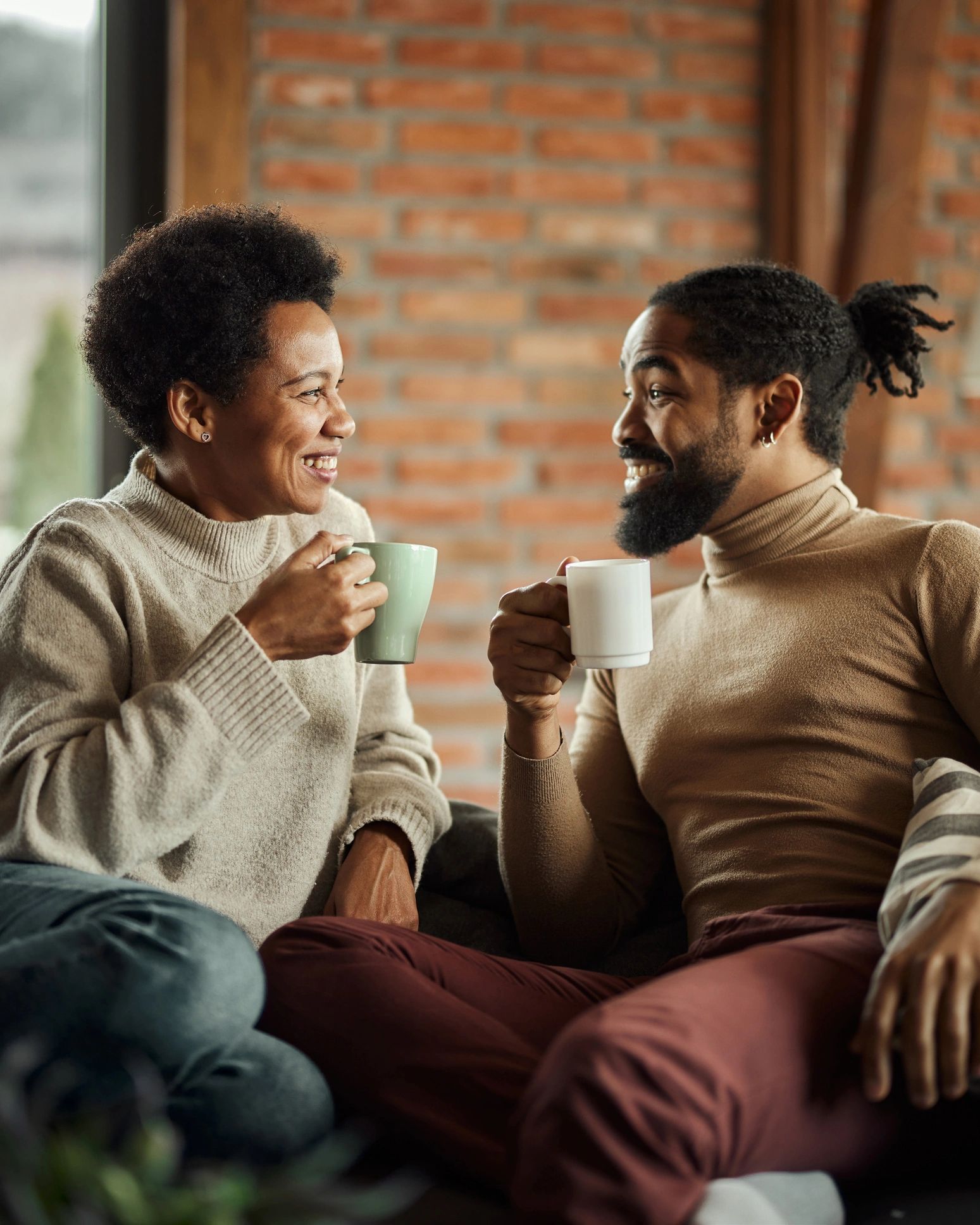 Two people sharing a warm connected moment
